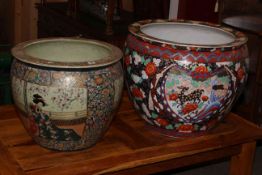 Two large Oriental pottery fish bowls