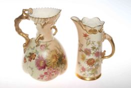 Two Royal Worcester floral decorated jugs,