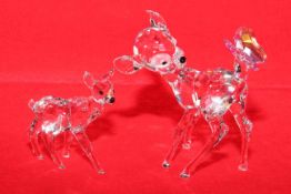 Swarovski Bambi with butterfly and another Bambi,