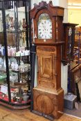 Antique mahogany eight day longcase clock having painted arched dial, signed Buxton,