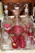Collection of cranberry and other glassware including decanters, atomisers,
