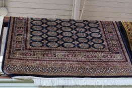 Bokhara rug with a blue ground 1.90 by 1.