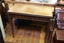Victorian mahogany fold top tea table on square tapering legs, 72.