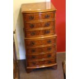 Bevan Funnell Ltd Reprodux burr walnut bow front chest of seven drawers