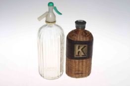 Wicker bound bottle with letter 'K' and a vintage soda siphon (2)