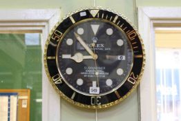 Black and gold cased quartz wall clock