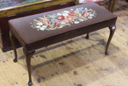 Floral needlework double stool on cabriole legs,