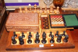 Chess set with board and two small portable chess sets