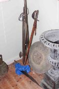 Collection of various weapons including three swords, axe,