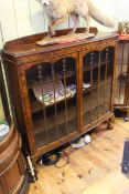 1920's mahogany two door china cabinet on ball and claw legs,