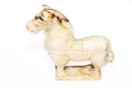 A Chinese hardstone carving of a standing horse, in Archaic style, height 13.