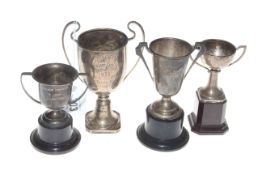 Four silver trophies