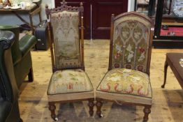 Victorian mahogany arched back prie dieu chair in floral woolwork together with a similar prie dieu