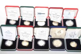Collection of ten boxed silver proof coins, seven £2 and three £5,