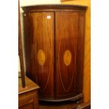 Inlaid mahogany two door bow front standing corner cupboard and string inlaid mahogany two door