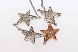 Two tone 14 carat gold and diamond star necklace