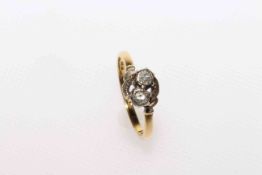18 carat gold and diamond crossover ring,