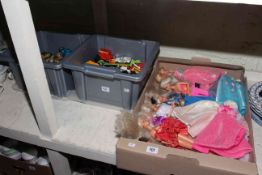 Collection of Barbie and Ken dolls,