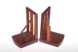 Pair of cricket theme bookends modelled as stumps,