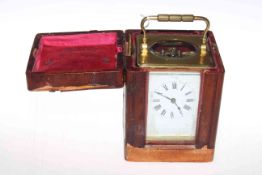 Late 19th Century brass cased striking carriage clock in travelling case