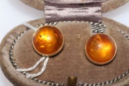 Pair of amber coloured and gold earrings
