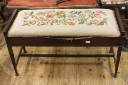 Edwardian mahogany duet stool with floral tapestry seat,