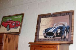 Two painted wooden plaques of classic cars