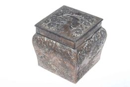 Chinese silvered copper caddy with relief decoration