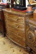 Regency mahogany bow front chest of four long drawers on turned legs, 106cm by 114.