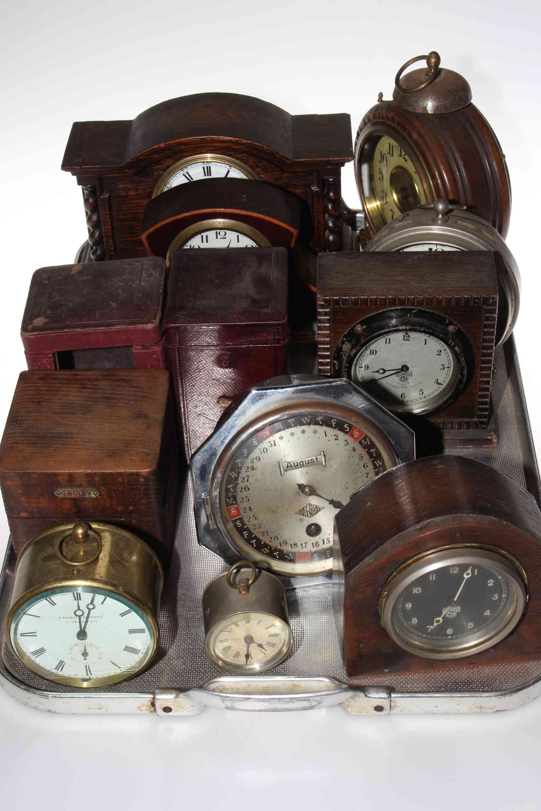 Collection of various clocks and cases