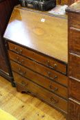 Edwardian mahogany and satinwood inlaid four drawer bureau