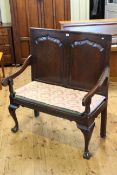 Antique oak settle with double fielded arched panel back, 112.