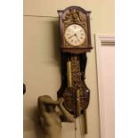 Large triple weight wall clock with brass embossed pendulum