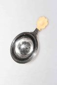 Austrian silver tea strainer with ivory handle,