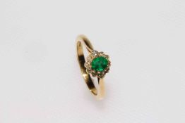 18 carat gold, emerald and diamond ring,