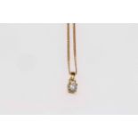18 carat gold single stone diamond pendant on 9 carat gold chain