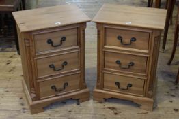 Pair pine three drawer bedside pedestals,