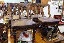 Set of four late Victorian oak turned leg dining chairs