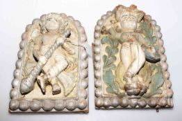 Pair of Indian carved and painted panels,