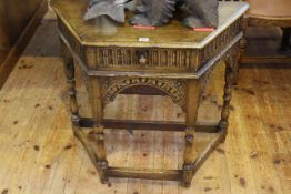 Period style carved oak canted corner single drawer hall table, 74cm by 83.