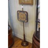 Regency brass and mahogany adjustable pole screen with needlework panel