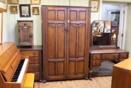 Three piece oak bedroom suite together with a similar pot cupboard