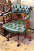 Green buttoned leather captains style swivel desk chair