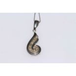 9 carat and diamond swirl pendant on chain