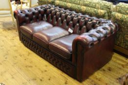 Ox blood deep buttoned leather three seater Chesterfield settee