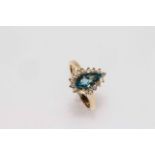 14 carat gold, blue topaz and diamond ring,