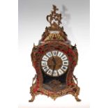 Boulle style mantel clock with gilt metal mounts of waisted form with enamel Roman numerals