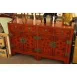 Oriental red lacquered four door sideboard