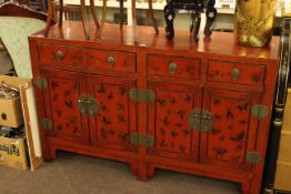 Oriental red lacquered four door sideboard