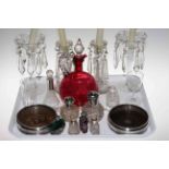 Two pairs of glass lustre drop candlesticks, cranberry glass ewer, pair of silver coasters,